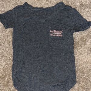 Super soft, stretchy dark grey shirt. I think I got her at Walmart.